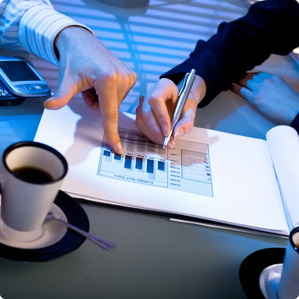 A man and woman collaborate on a business plan