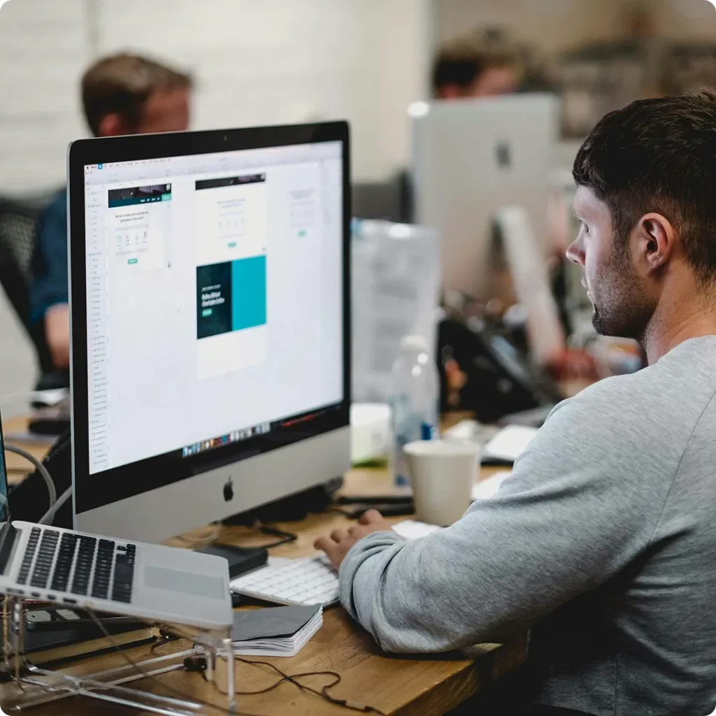 A man typing on a computer