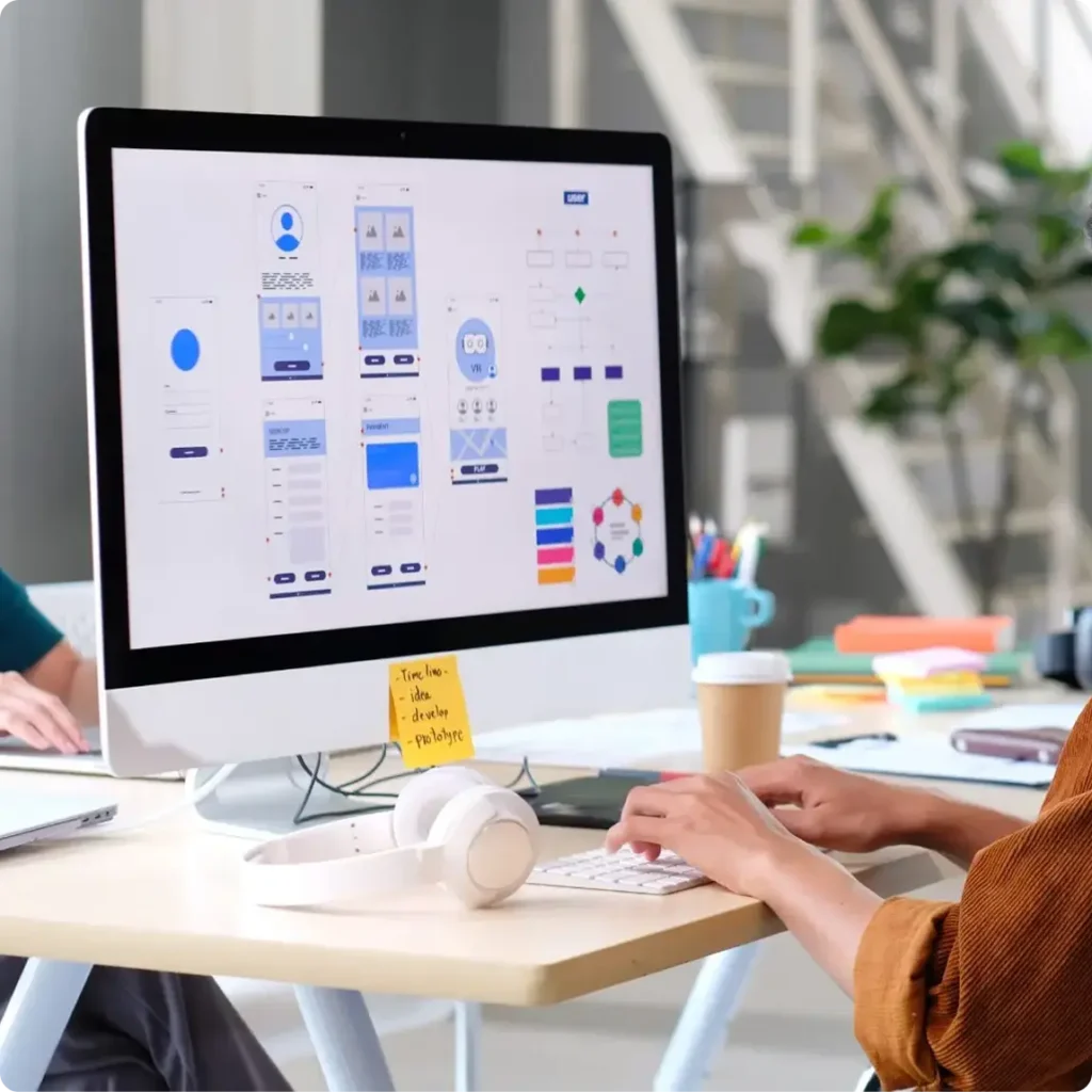 A woman works on a computer