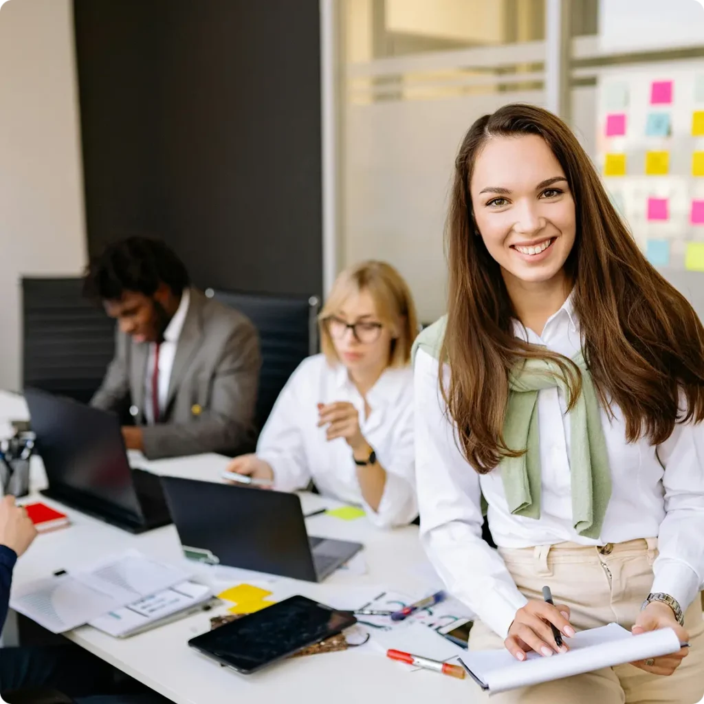 A smiling woman in a business suit