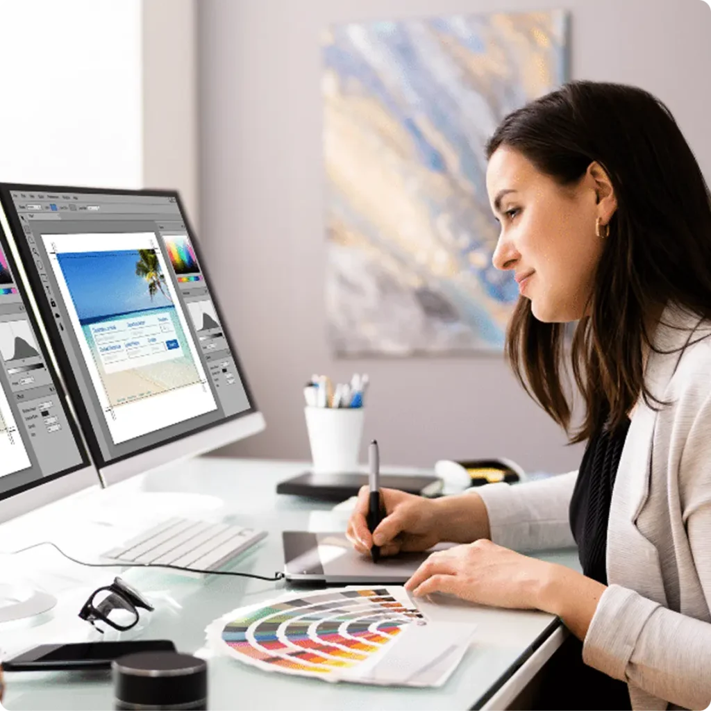 A woman focused on her computer