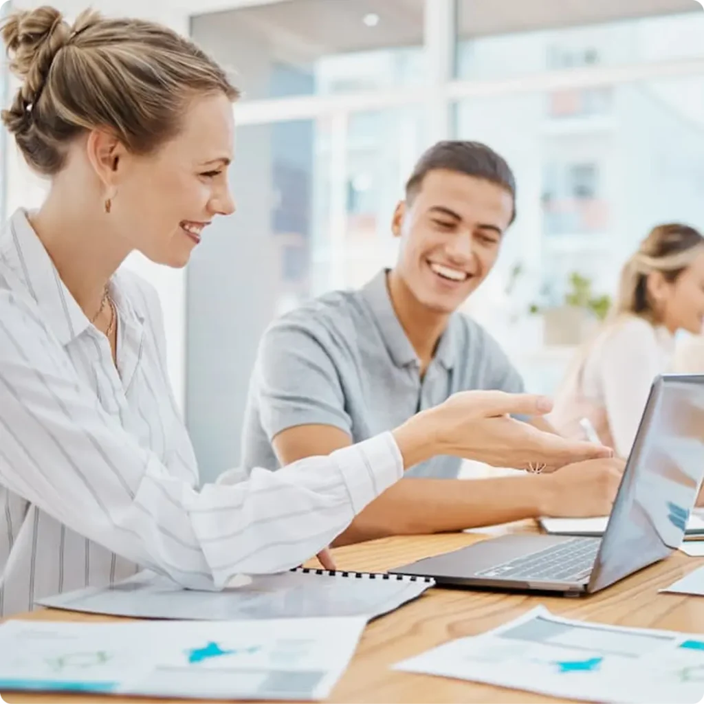 Two individuals seated at a table